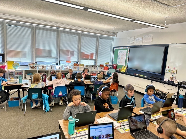 Skyway students engaged in morning literacy and technology.  Remember, “First we work hard (and listen), then we play”… words of wisdom, indeed!