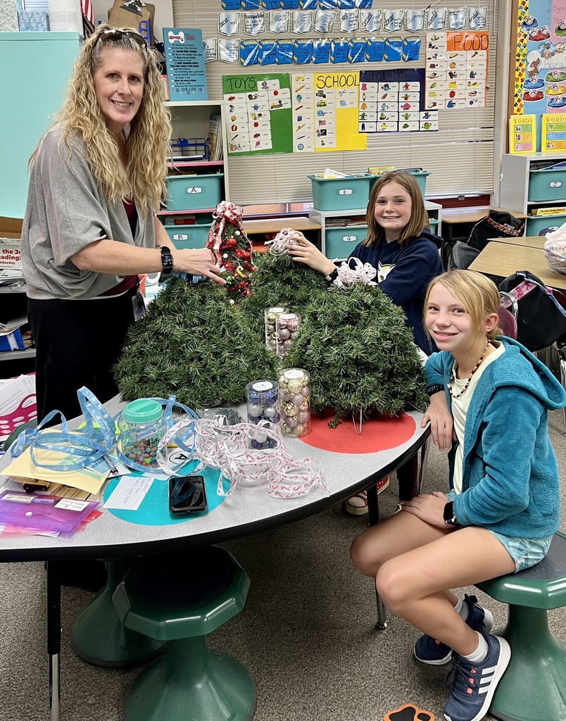 Ms. Gross' After School Program. The Cougars created a Mini Light Up Christmas Tree. 