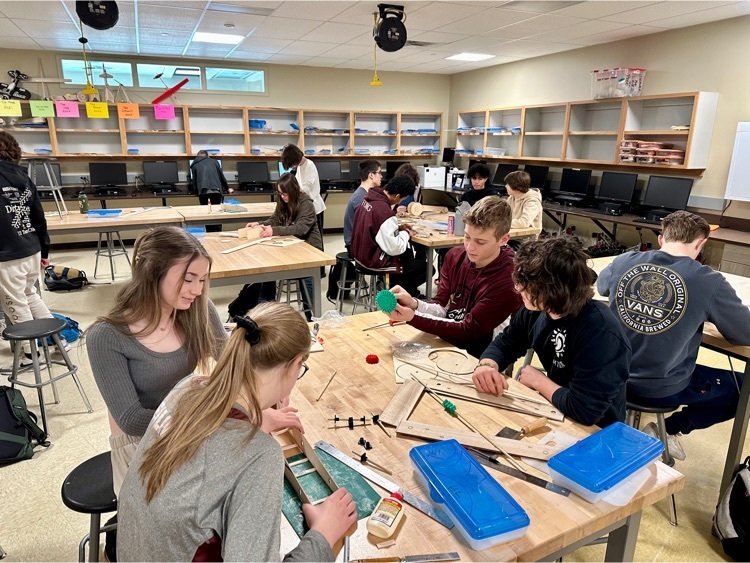 CMHS students engaged in Drawing, Ceramics, Sculpture, and Introduction to Engineering.